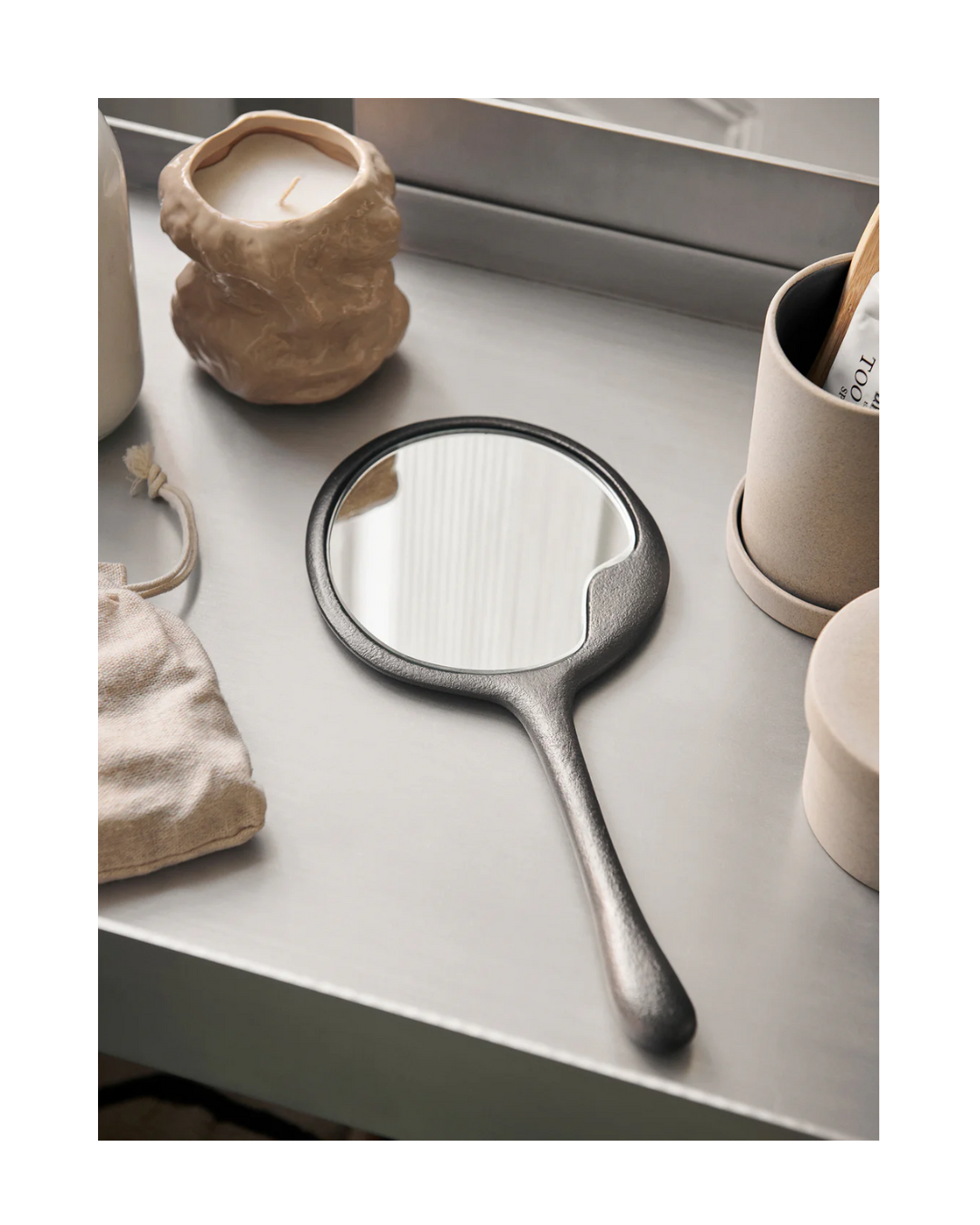 Lava Hand Mirror Blackened Aluminium